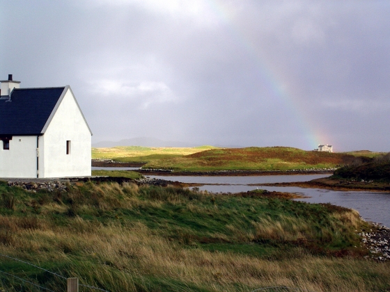 Could there be a pot of gold in the cottage at the end of the rainbow ? - photo taken from the A865 heading south eastwards into lochmaddy